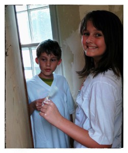 Jaden and Kyler painting the walls